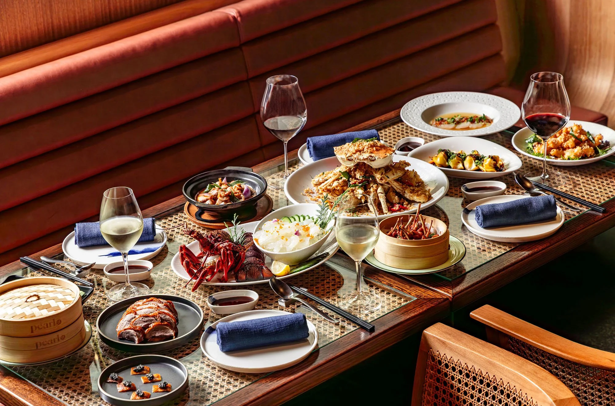 A table set with modern Cantonese dishes at Pearl Dining